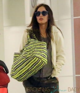 Megan Fox shows a little bit of her belly while in JFK airport with Brian Austin Green in NYC