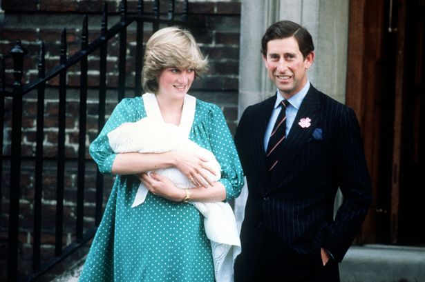 Princess Diana and Prince Charles outside of St. Mary's Hospital with Prince William