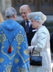 Queen Elizabeth II and Prince Philip, Duke of Edinburgh arrive at the 60th Anniversary of the Coronation Service at Westminster Abbey in London