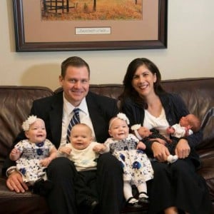 Sarah and Andy Justice with their twins and triplets