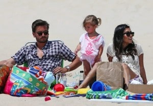 Scott Disick and Kourtney Kardashian at the beach with daughter Penelope