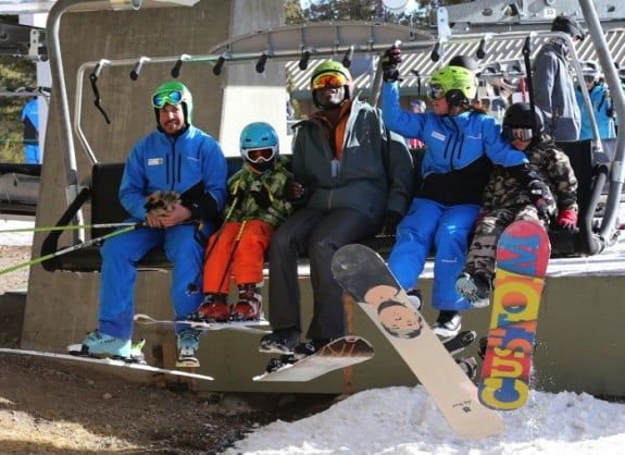 Seal on the ski lift at Mammoth Mountain with his  kids Leni and Henry