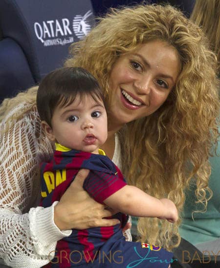 Shakira and baby son cheer on dad