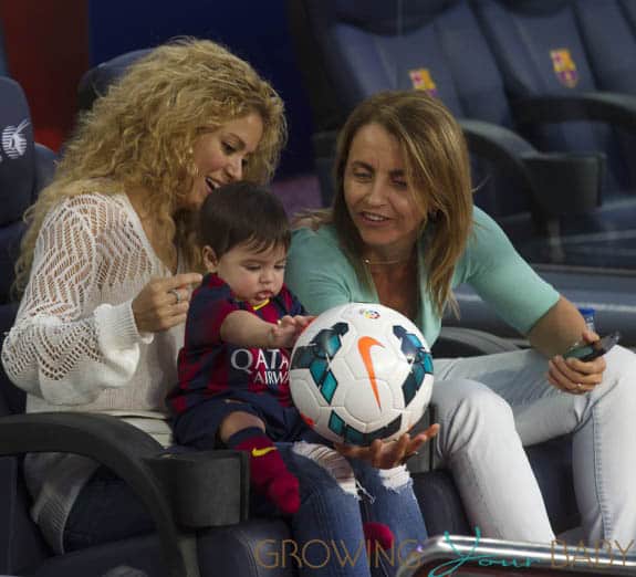 Shakira and baby son cheer on dad