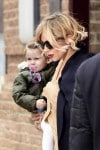 Sienna Miller carries baby Marlowe while checking out of The Greenwich Hotel in Tribeca, NYC