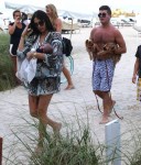 Simon Cowell and his girlfriend Lauren Silverman with baby Eric in Miami