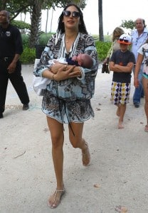 Simon Cowell & his girlfriend Lauren Silverman with baby Eric in Miami