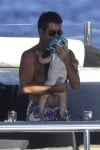 Simon Cowell with son Eric in Sardina