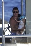 Simon Cowell with son Eric in Sardina