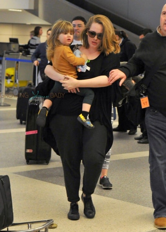 Singer Adele and her son Angelo Konecki arriving on a flight at LAX