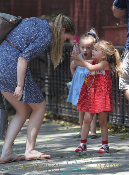 Twin daughters of Sarah Jessica Parker, Marion Broderick and Tabitha Broderick walk home from school with their nanny in the west village of New York City