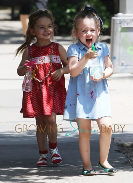 Twin daughters of Sarah Jessica Parker, Marion Broderick and Tabitha Broderick walk home from school with their nanny in the west village of New York City