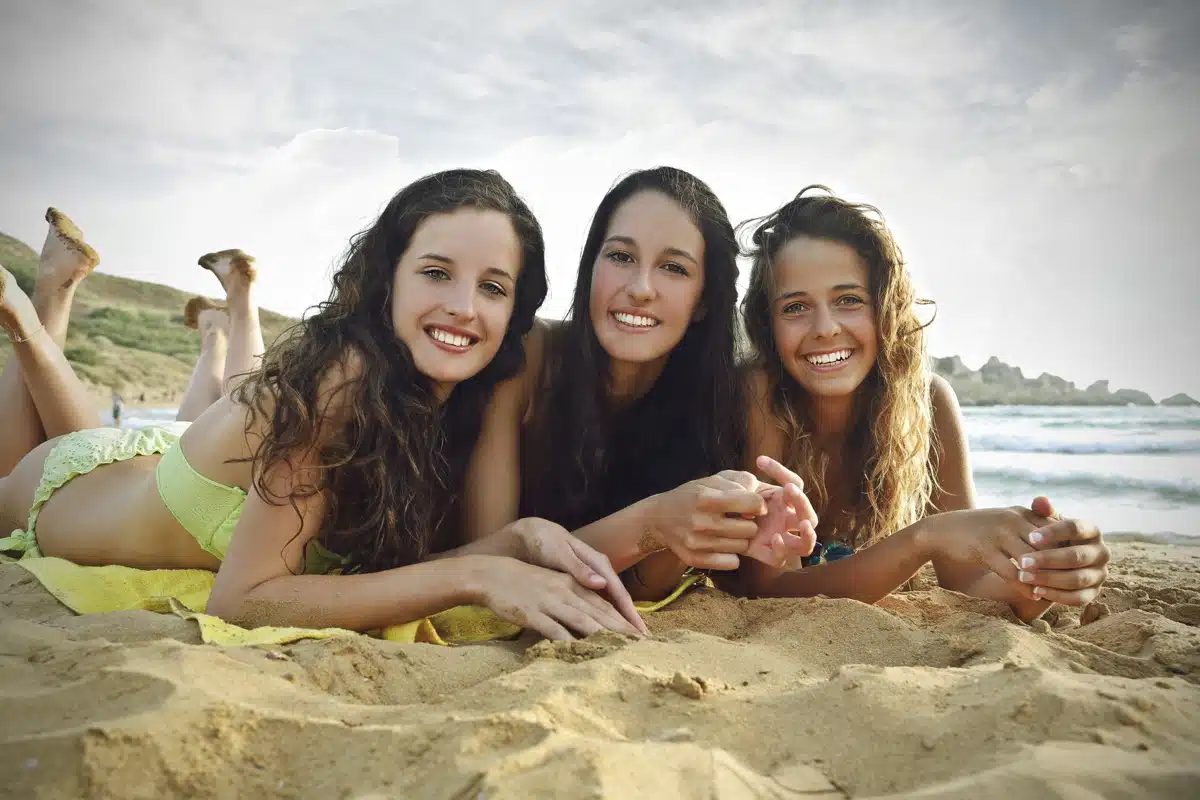 Teens Suntanning at the beach