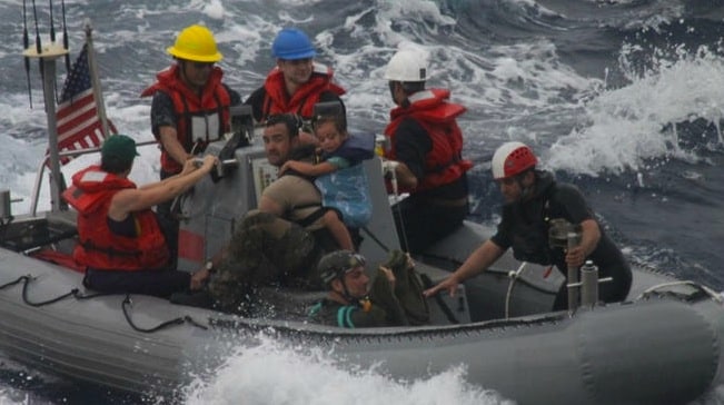 The Kaufman family being rescued by the coastguard