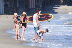 Tori Spelling with kids Finn, Hattie, Stella, Liam and Jack at the beach in Malibu