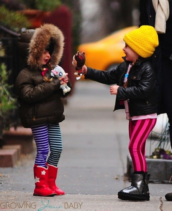 Twins Tabitha (Loretta) and Marion Broderick on their way to school