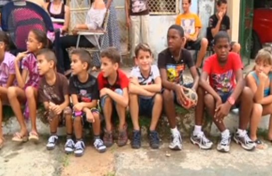 Twins in Havana, Cuba lined up