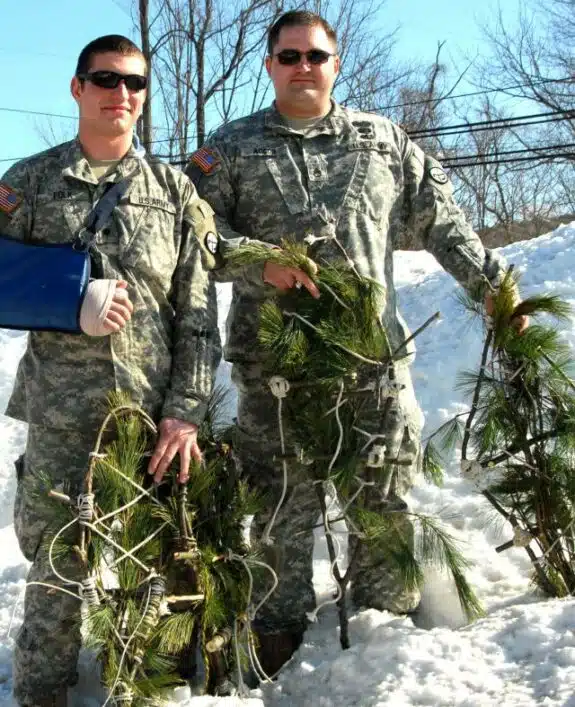 Two medical officers, Staff Sgt. Harry F. Accor III and Spc. Derek C. Folk