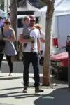 Will Kopelman at the farmer's market with daughter Olive