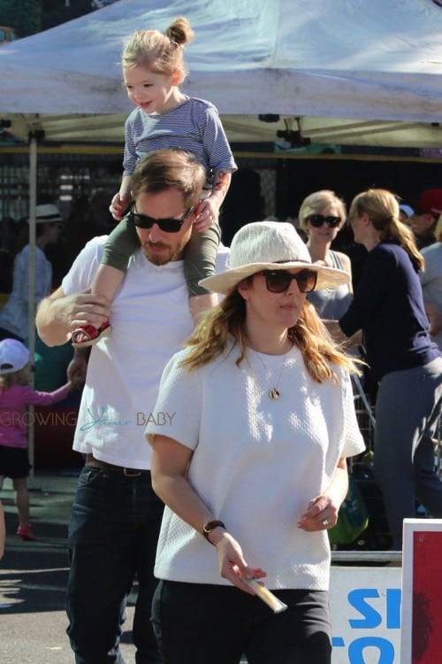 Will kopelman and Drew Barrymore at the market with daughter Olive