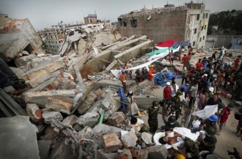 Workers search for survivor at the  Garment Building collapse in Bangladesh