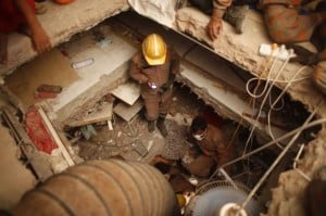 Workers search for survivor at the  Garment Building collapse in Bangladesh