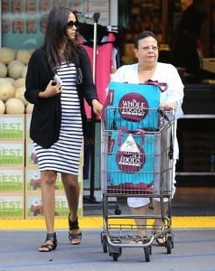 Zoe Saldana shows off a rounded tummy while out shopping