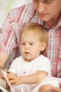 dad reading daughter