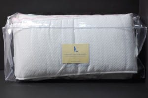 image of recalled pottery barn Matelasse Crib Bumpers