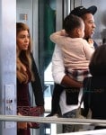 jay Z and Beyonce board a Train in Paris with their daughter Blue