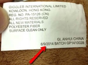 label on recalled Giggles International Animated Sing-Along Monkey toy