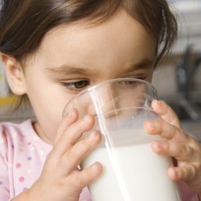 little girl drinking milk