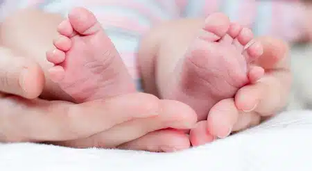 mom baby feet