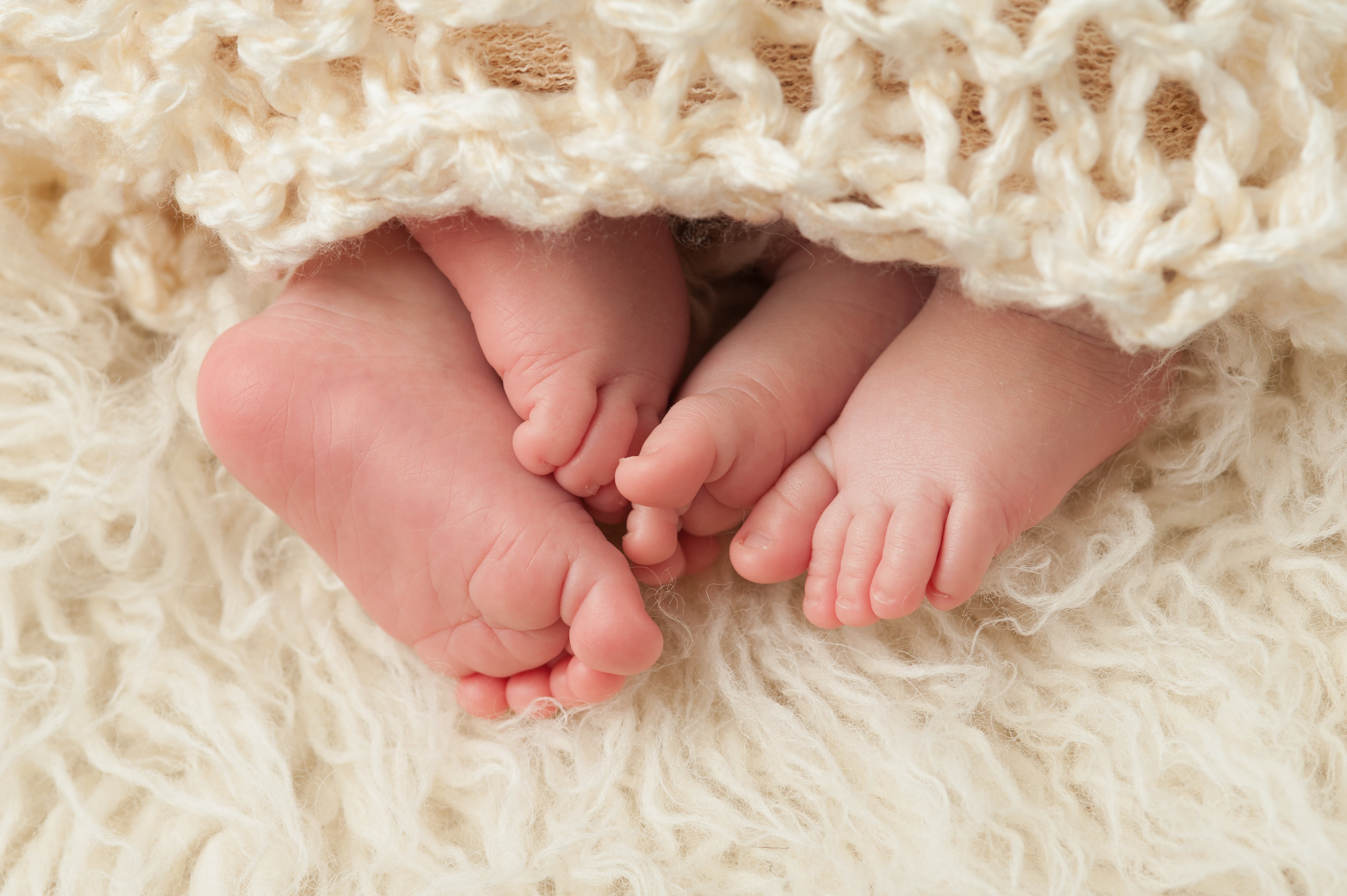 Feet of Newborn Baby Twins